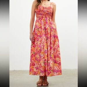 New with tags. Floral maxi dress spaghetti straps. Skies are Blue.